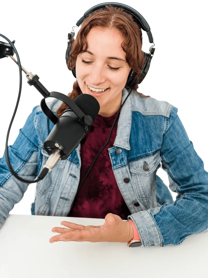 A podcaster with headphones speaking into a microphone